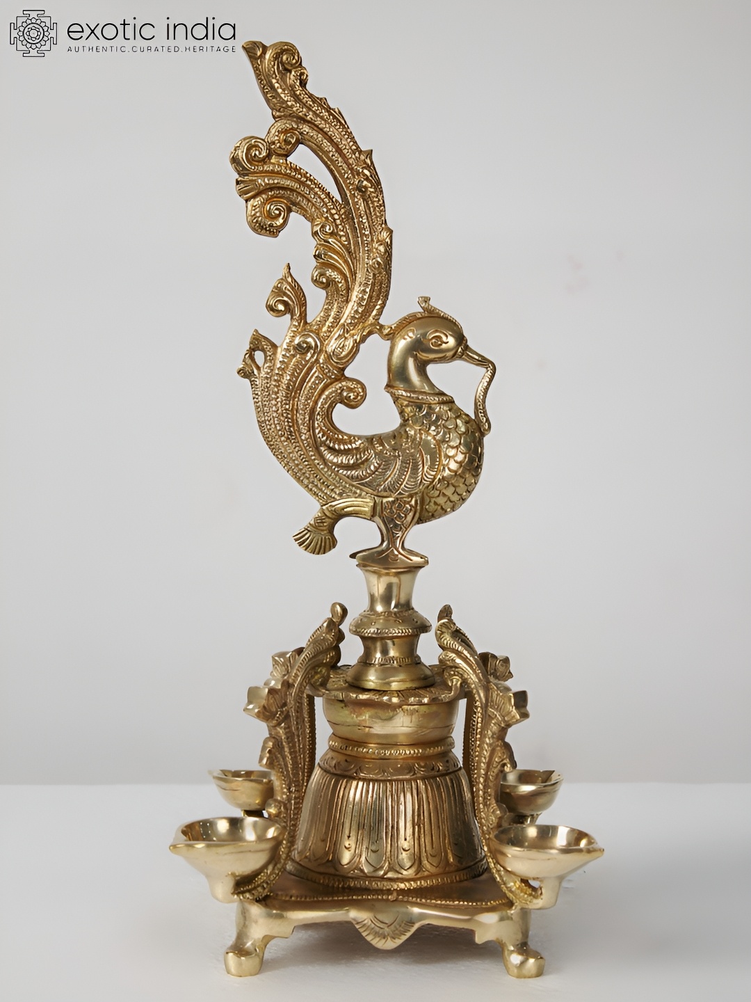 

Exotic India Brass Four Wicks Peacock Lamp, Gold