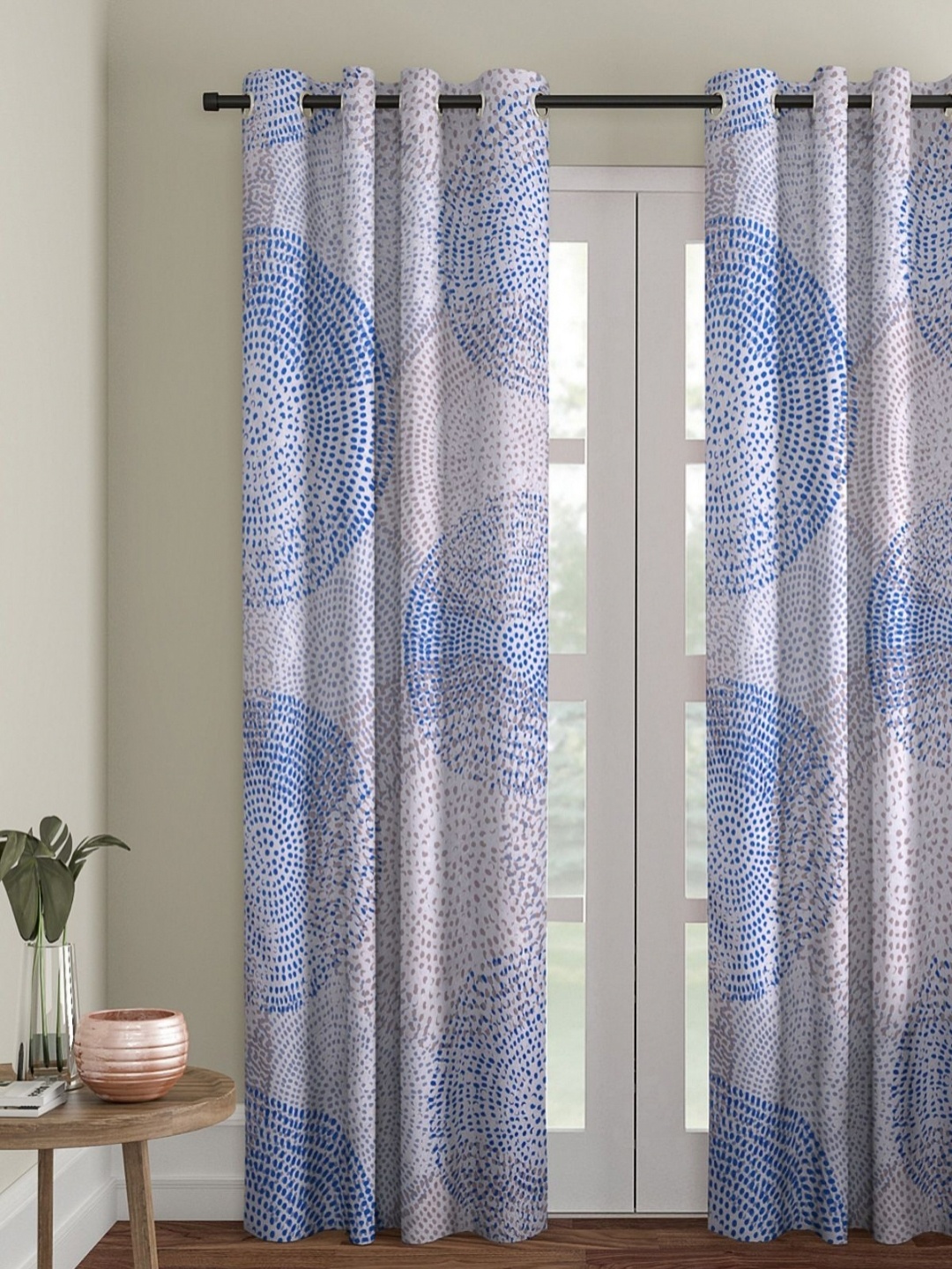

Myntra Elegant Homes Blue & White Geometric Room Darkening Door Curtain