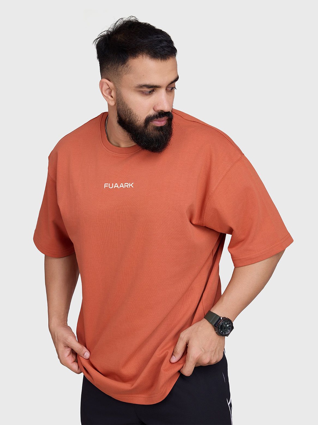 

FUAARK Men Solid Round Neck Cotton Oversized T-shirt, Rust