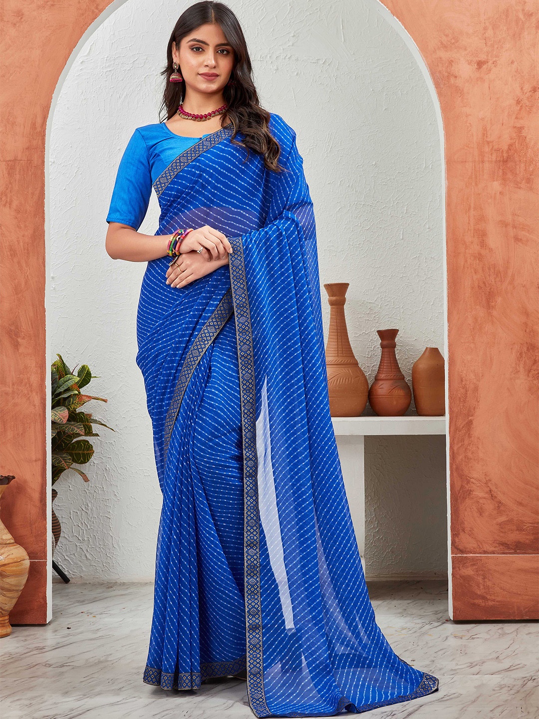 

Globon Impex Leheriya Zari Pure Georgette Saree, Blue