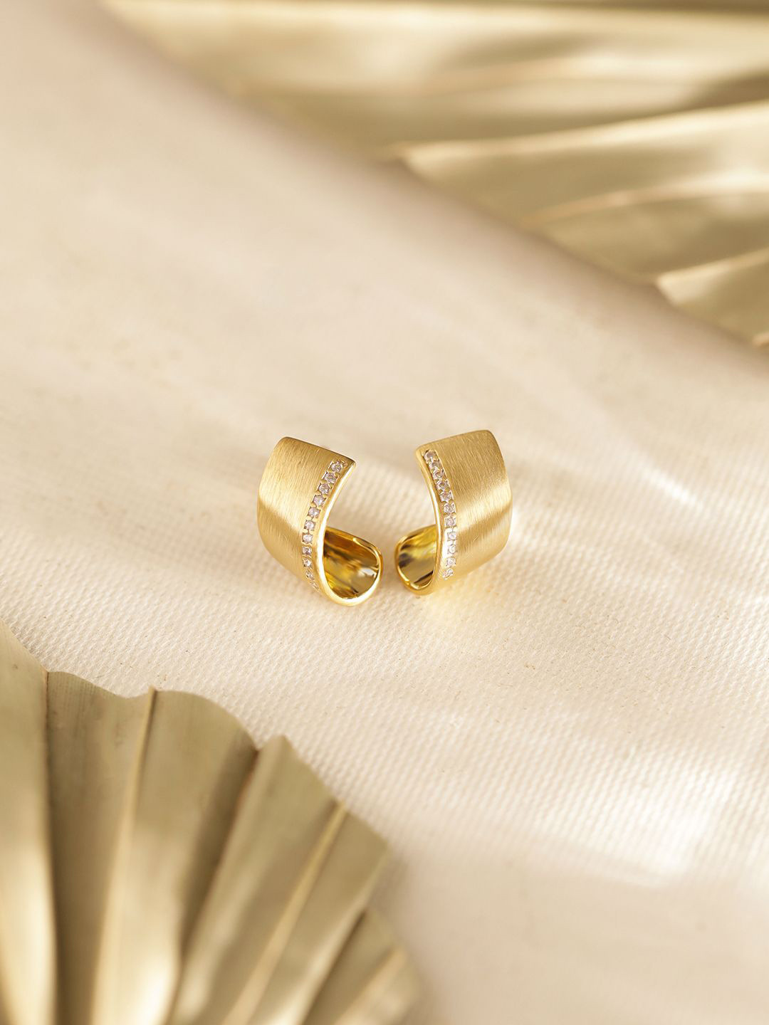 

Priyaasi Gold Plated Contemporary Studs Earrings