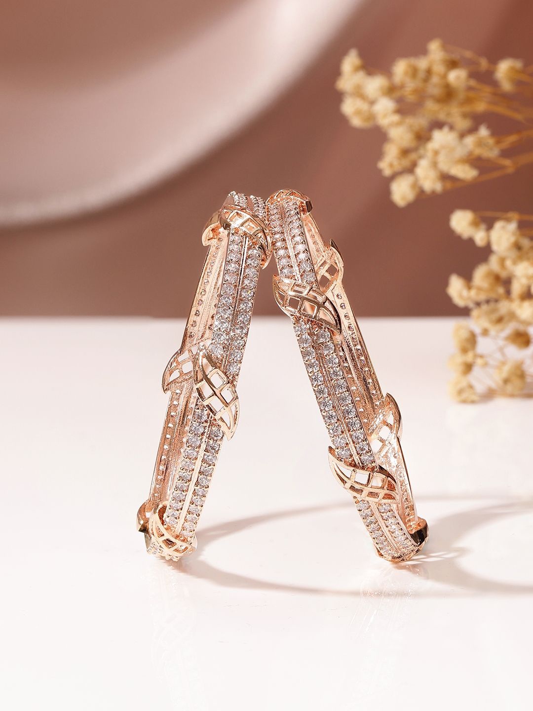 

Priyaasi Rose Gold Plated AD Stone Studded Bangles