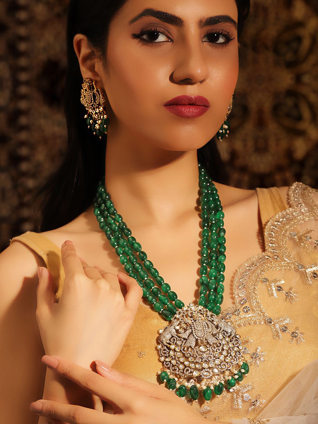 

Priyaasi Gold Plated American Diamond Stone Studded & Beaded Jewellery Set