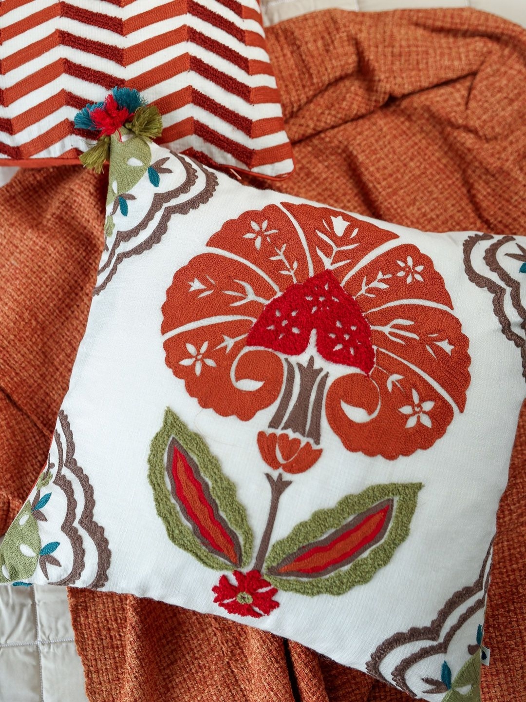 

ONSETHOMES raunak White & Rust Embroidered Square Cushion Cover