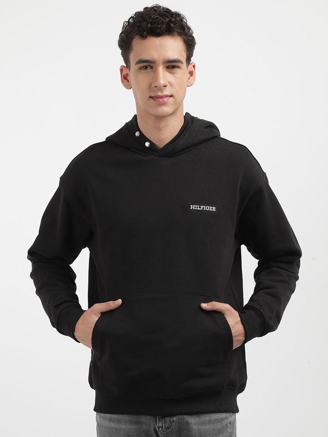 

Tommy Hilfiger Men Solid Hooded Sweatshirt, Black