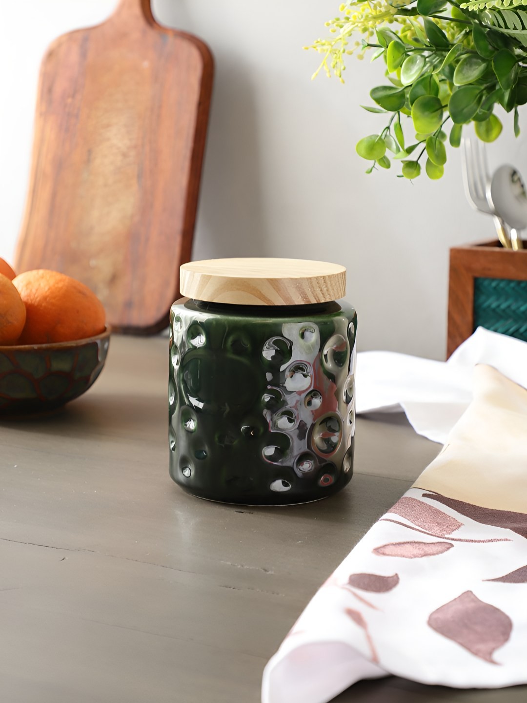 

The Decor Mantra Ceramic Dishwasher Safe Jar With Wooden Airtight Lid 800 ml, Green