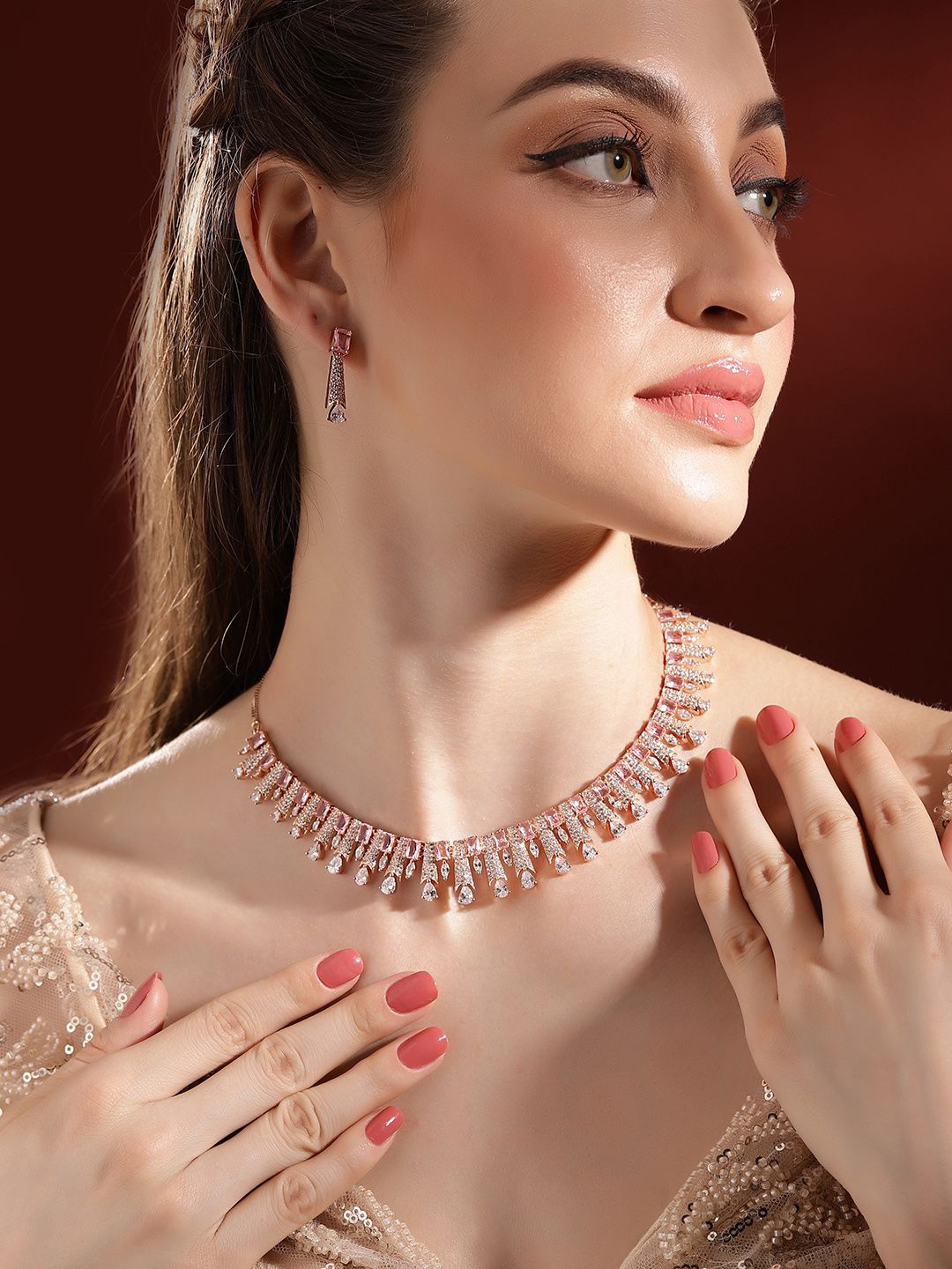

Priyaasi Rose Gold Plated American Diamond Stone Studded Jewellery Set