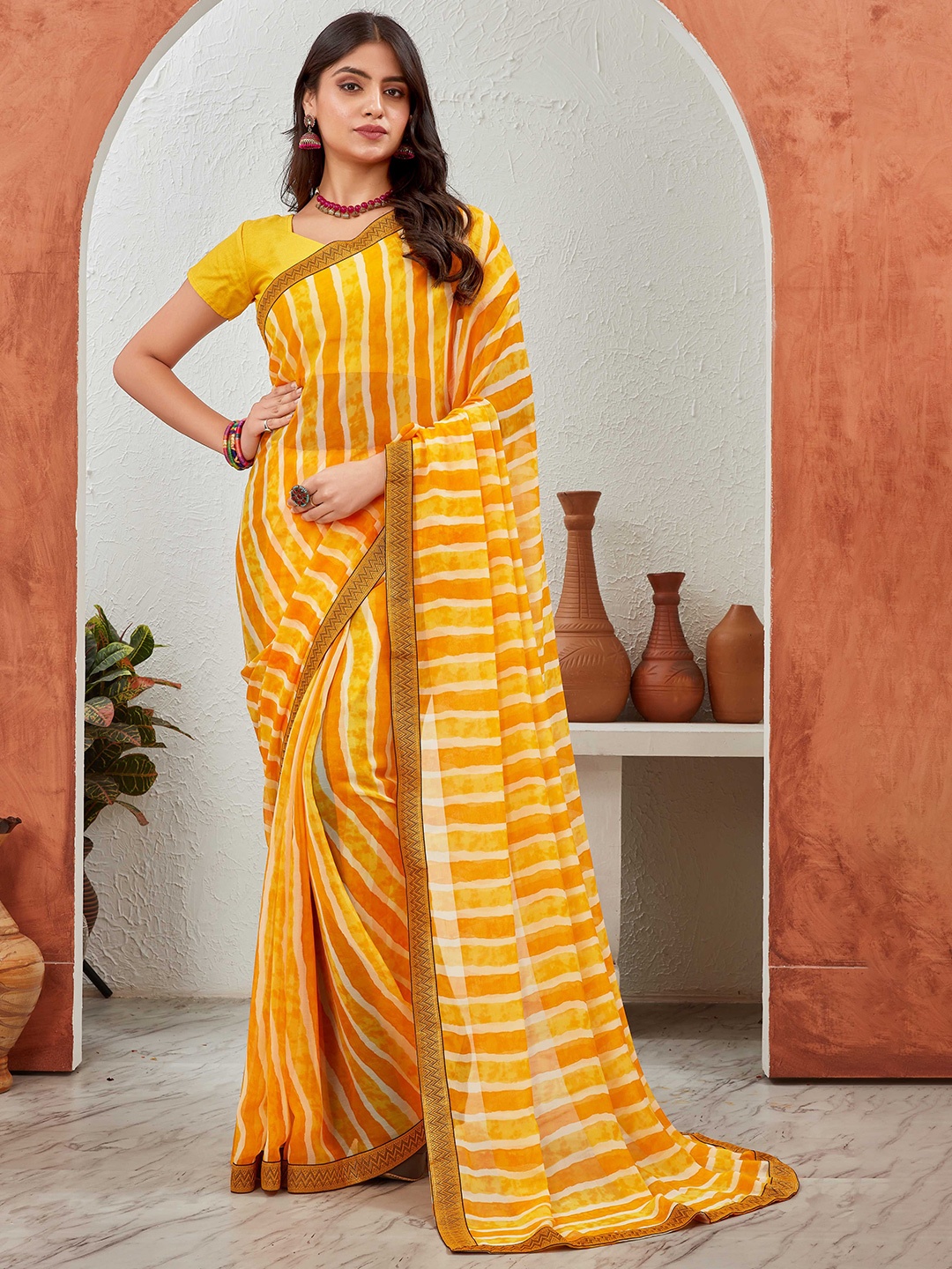 

Globon Impex Leheriya printed Woven Design Zari Pure Georgette Saree with blouse piece, Yellow