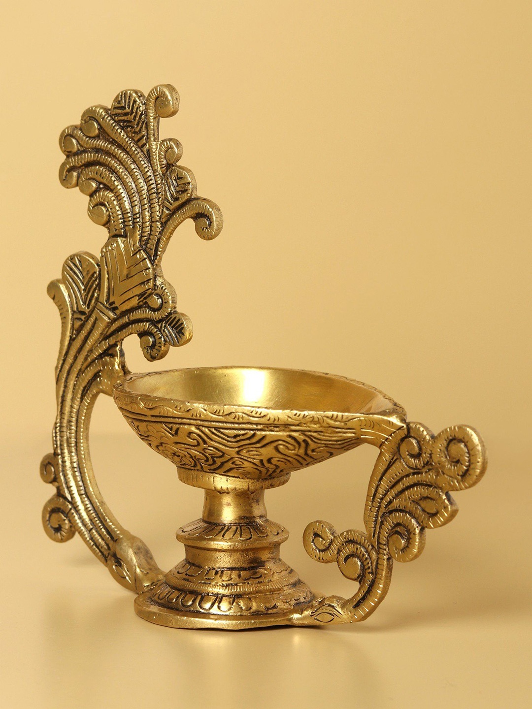 

Exotic India 8" Lamp with Traditional Handle in Brass, Gold