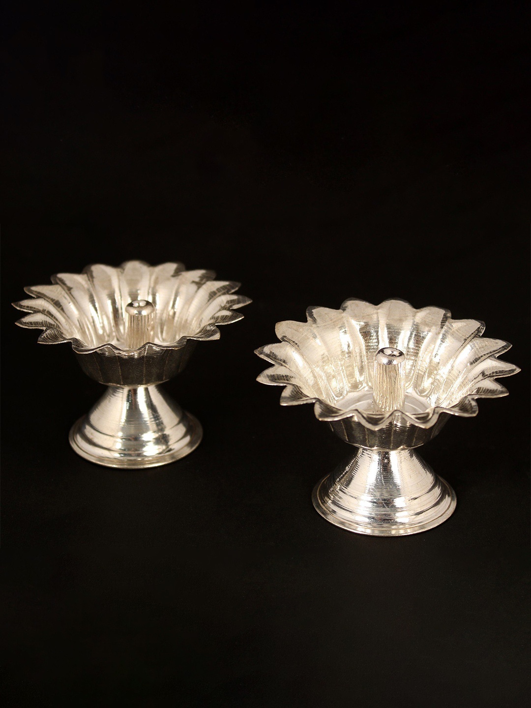 

Exotic India Brass Set of Flower Shaped Diya, Silver