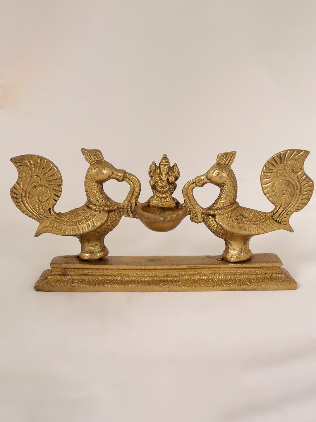 

Exotic India 7" Peacocks Design Lamp with Ganesha in Brass, Gold