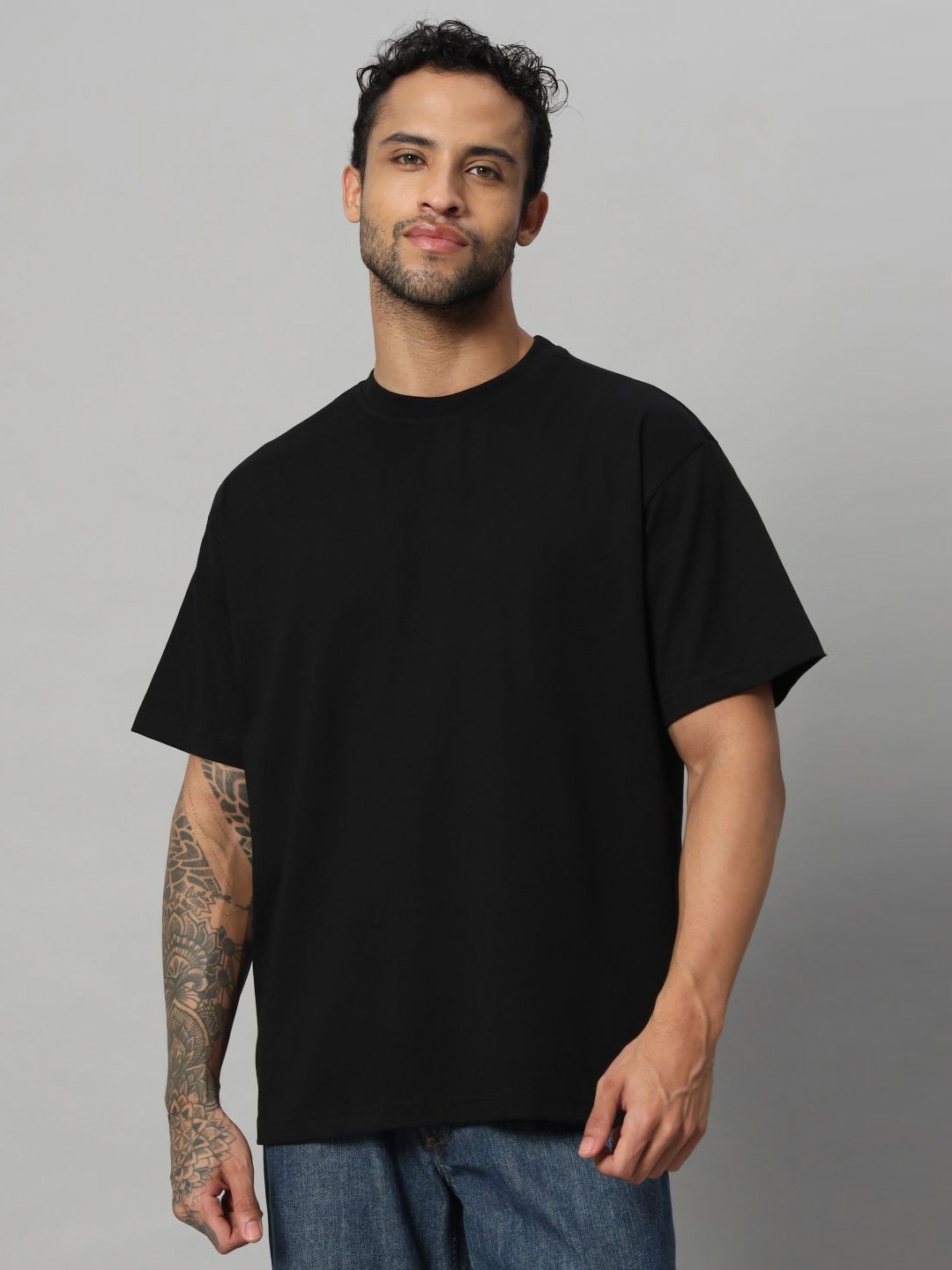 

SWAGNOX Men Solid Round Neck Cotton Oversized T-shirt, Black