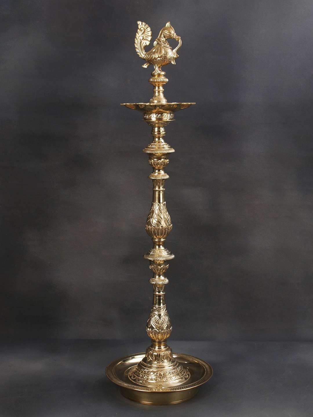 

Exotic India Brass Peacock Oil Lamp Stand, Gold