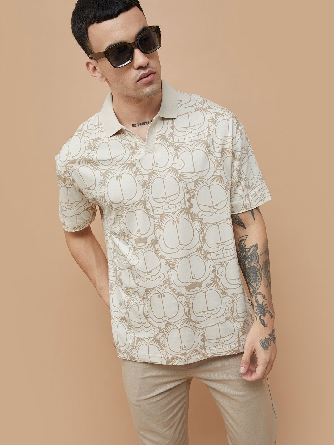 

Fame Forever by Lifestyle Men Graphic Printed Polo Collar Cotton Oversized T-shirt, Beige