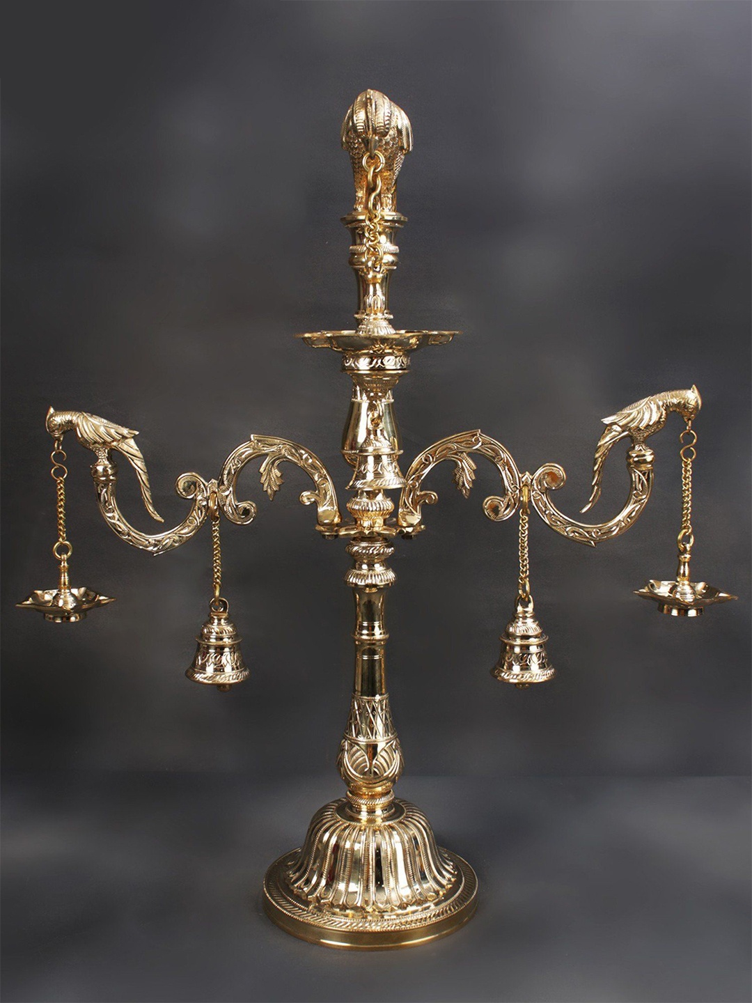 

Exotic India Bronze Superfine Parrot Lamp With Bells