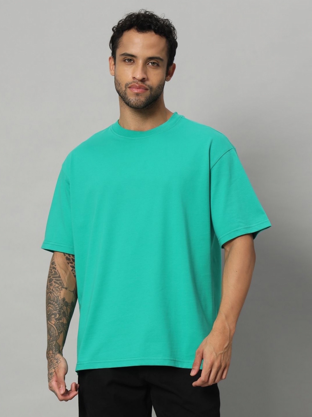 

SWAGNOX Men Solid Round Neck Cotton Oversized T-shirt, Green
