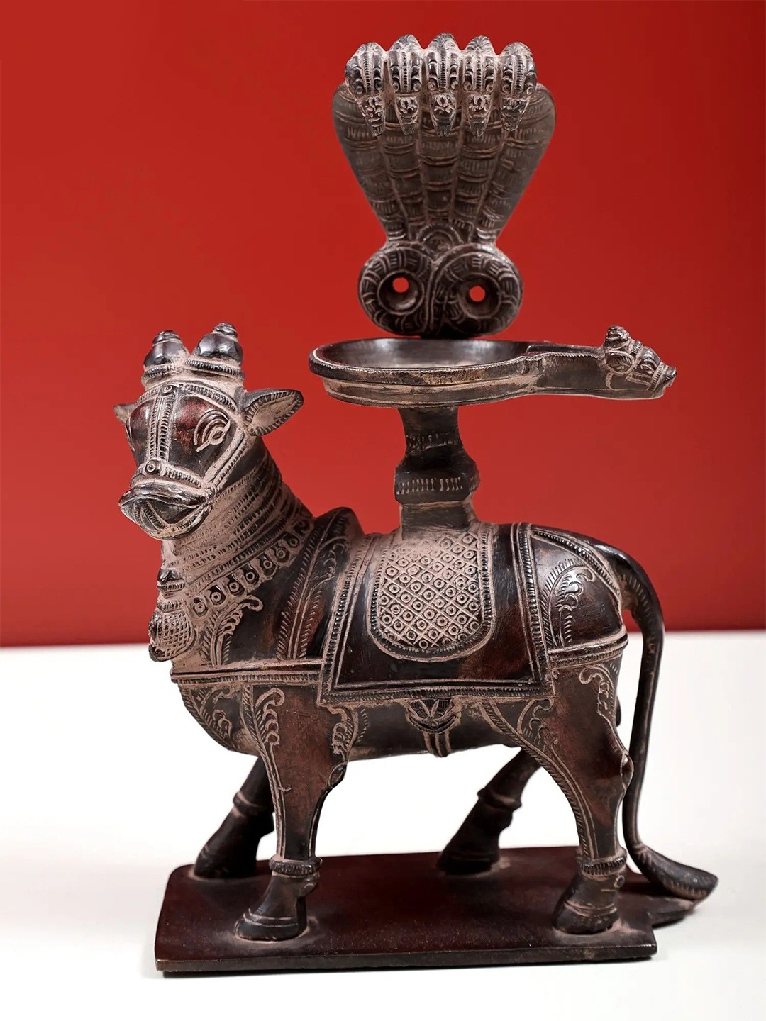 

Exotic India Brown Abhisheka On Nandi Showpiece