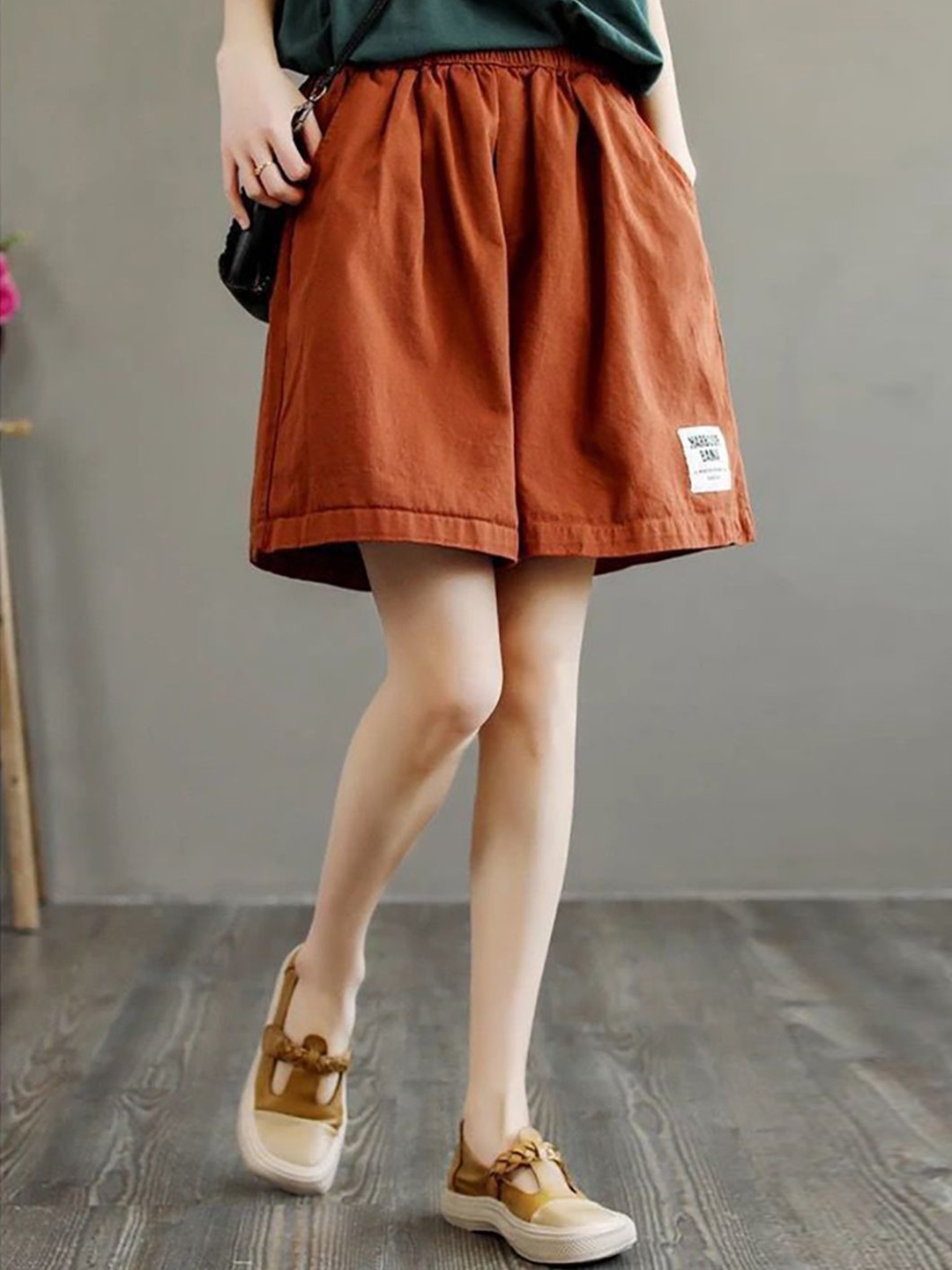 

StyleCast x Revolte Women Solid Mid-Rise Loose Fit Shorts, Brown