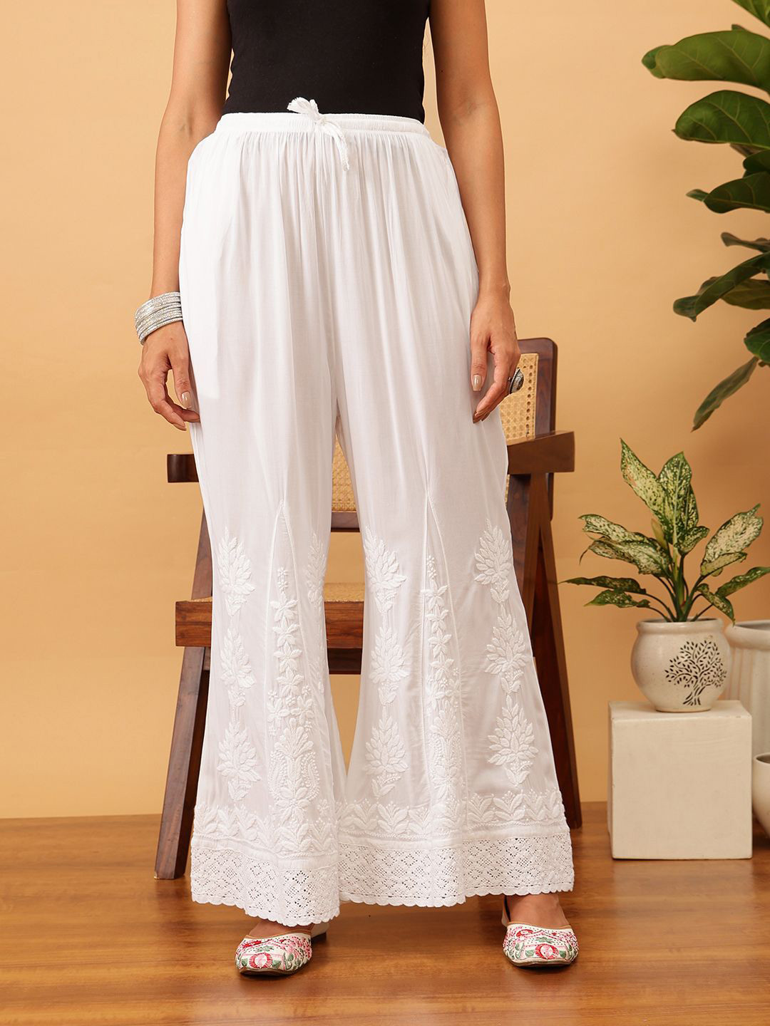 

ADA Women Ethnic Motifs Embroidered Flared Ethnic Palazzos, White