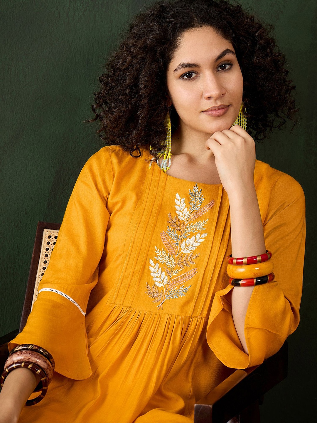 

Sangria Women Ethnic Motifs Embroidered Round Neck Top, Mustard