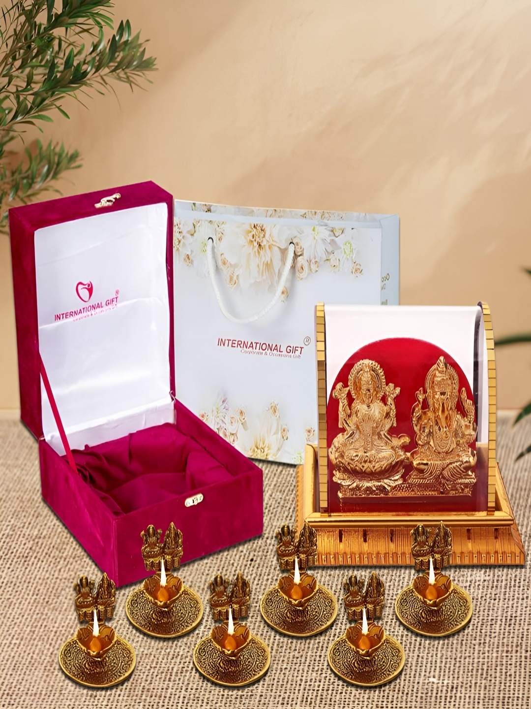 

INTERNATIONAL GIFT 7 Pieces Gold-Toned Laxmi Ganesh Idol & Diyas With Box