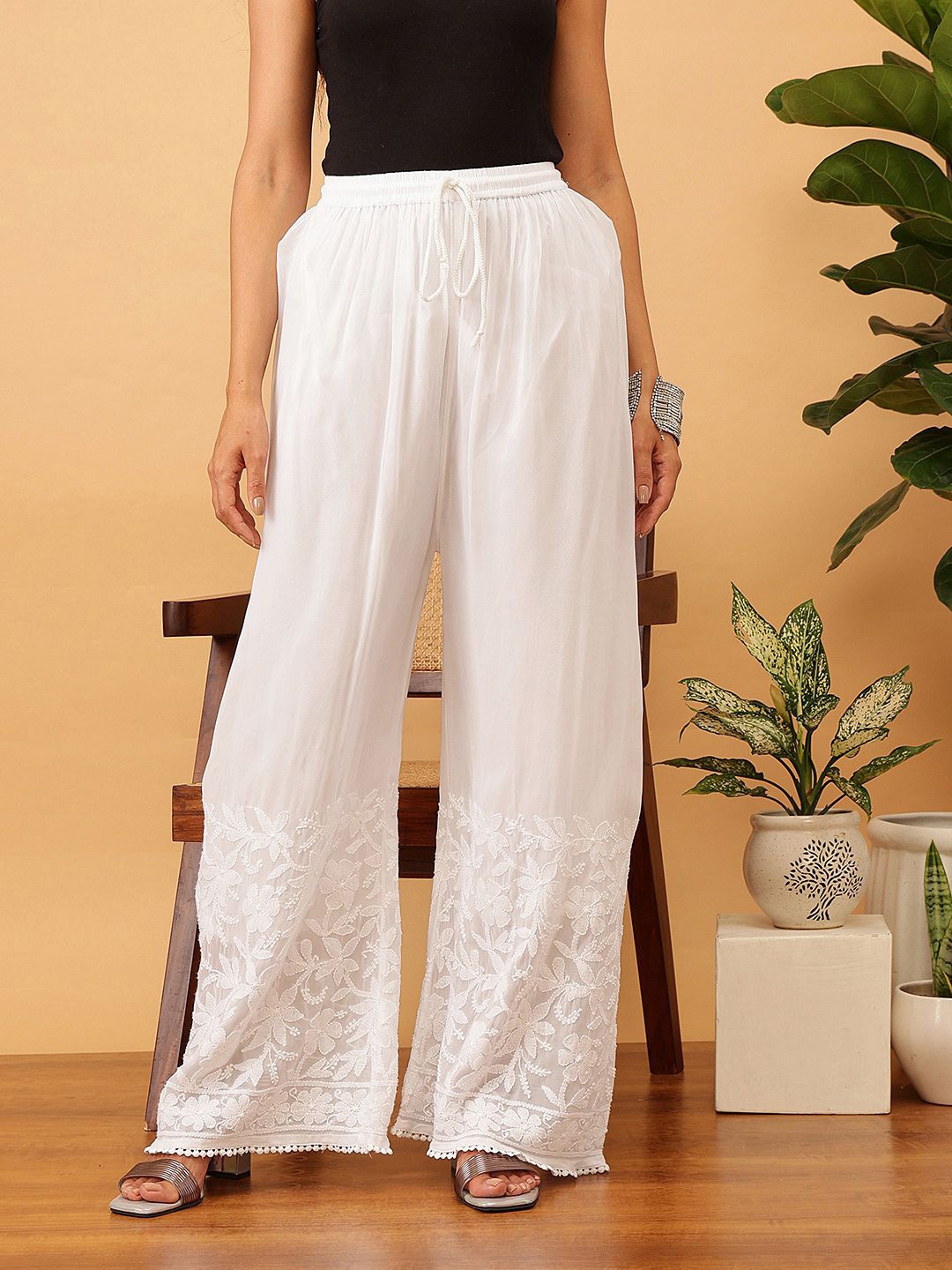 

ADA Women Ethnic Motifs Embroidered Flared Ethnic Palazzos, White