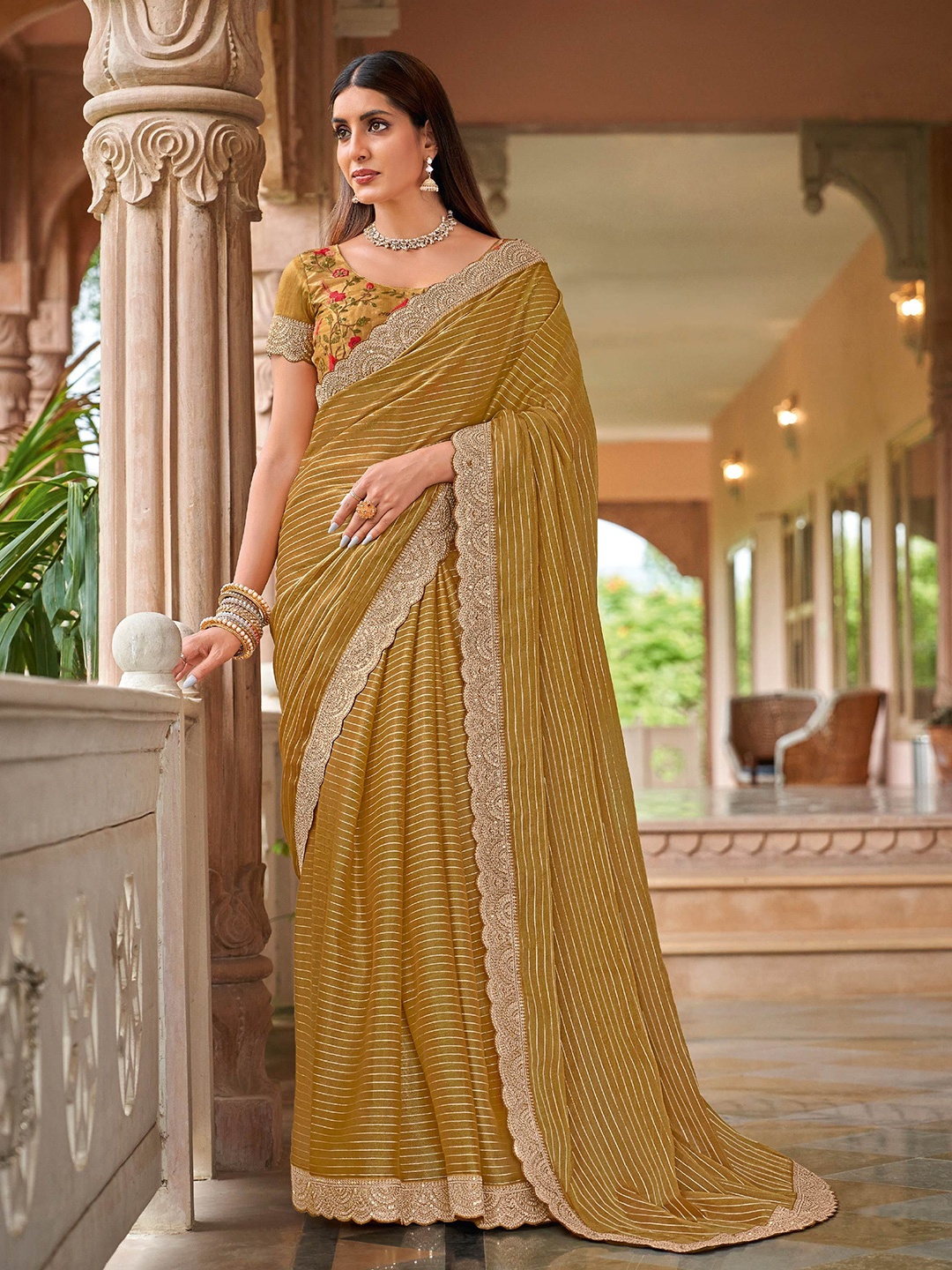 

Laxmipati Striped Embroidered Silk Blend Saree, Mustard