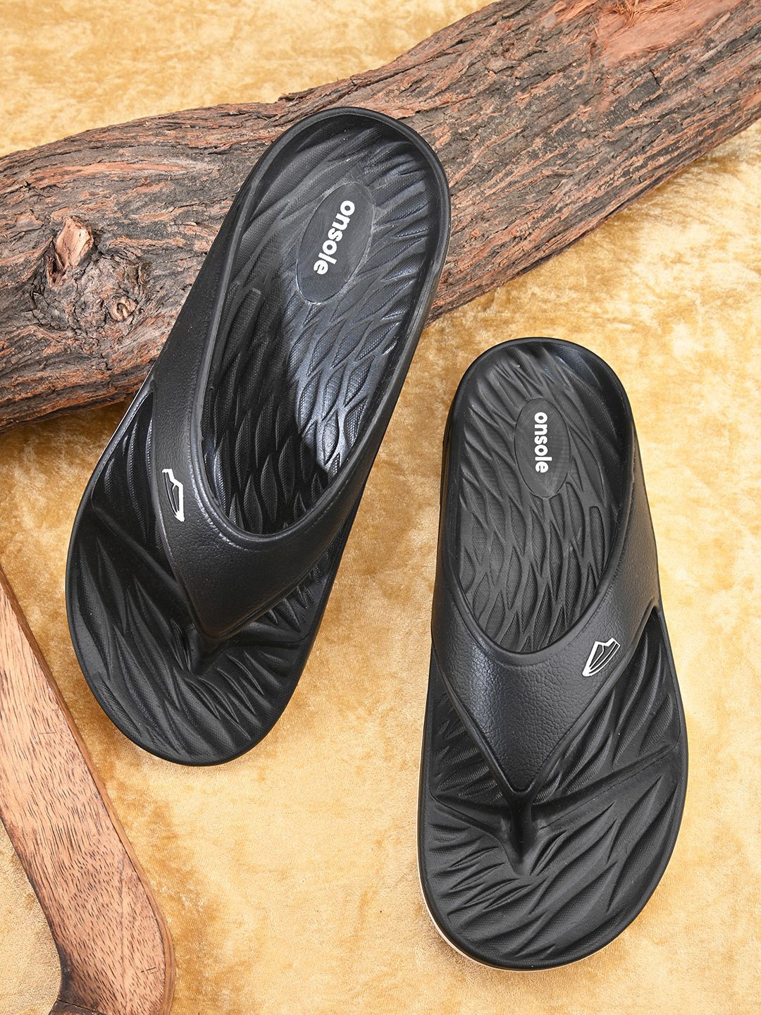 

ONSOLE Men Self Design Thong Flip-Flops, Black