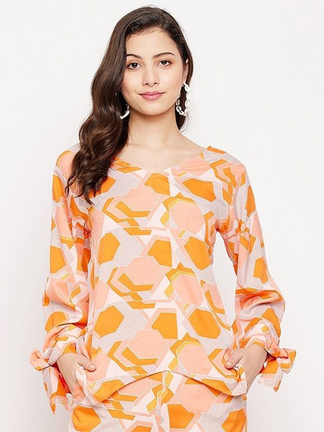 

Murcia Women Abstract Printed V-Neck Top, Orange