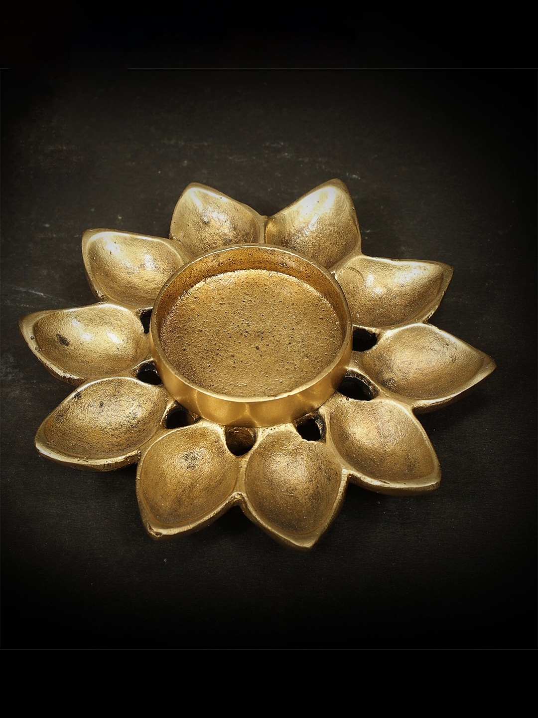 

Exotic India Gold Toned Textured Brass Pooja Diya