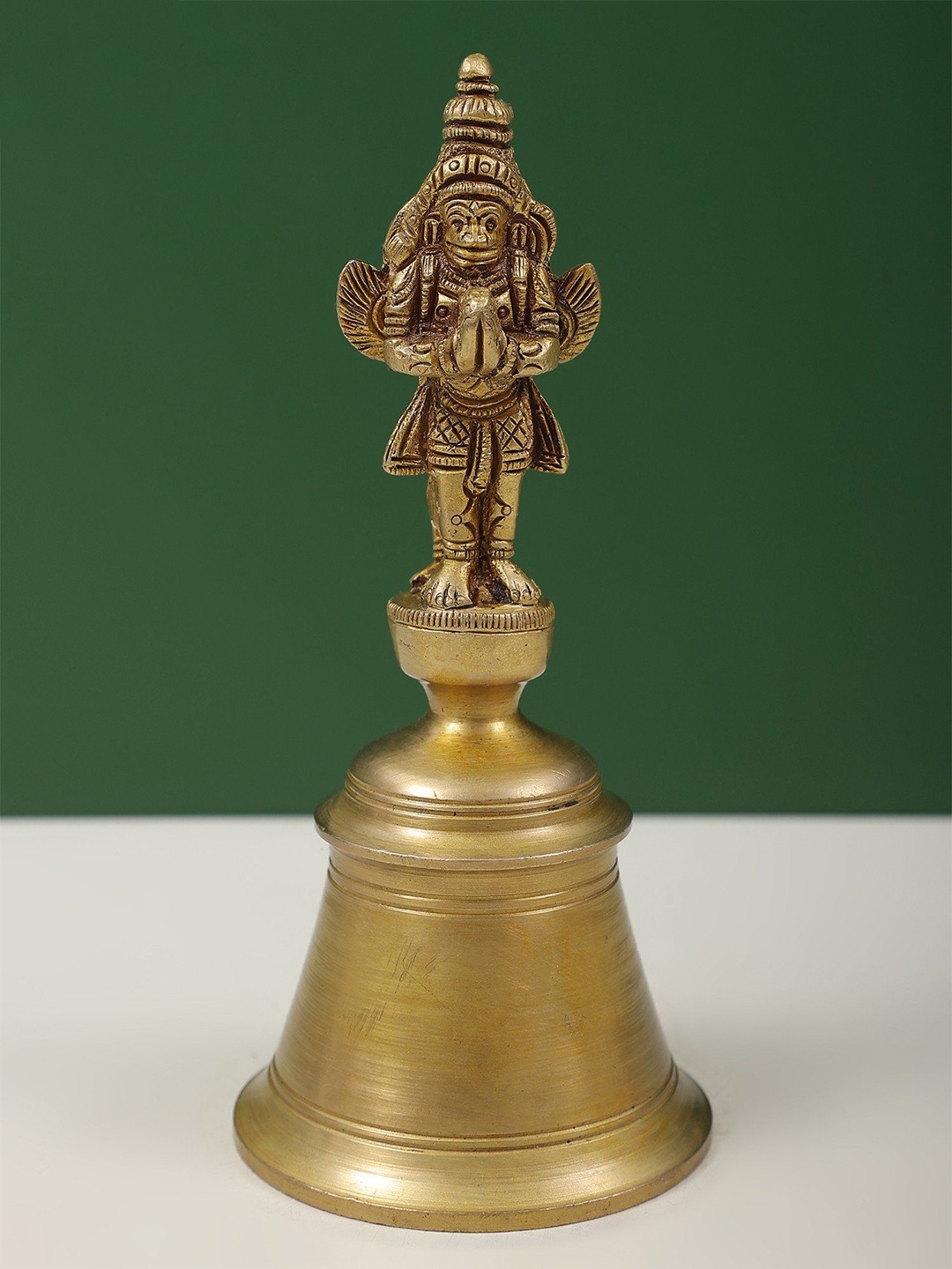 

Exotic India Garuda and Hanuman Brass Handheld Bell, Gold