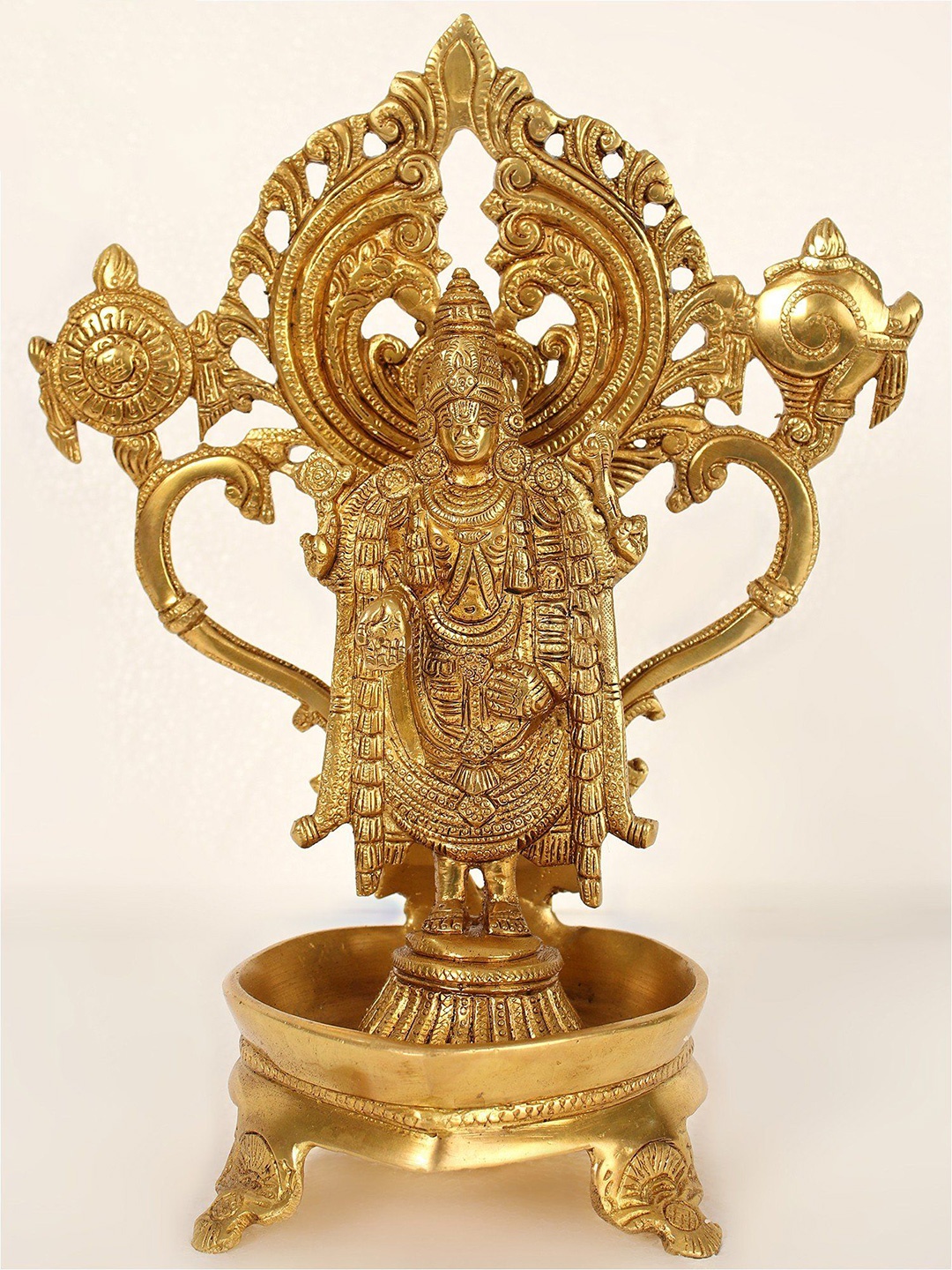 

Exotic India 11" Tirupati Balaji Lamp in Brass, Gold