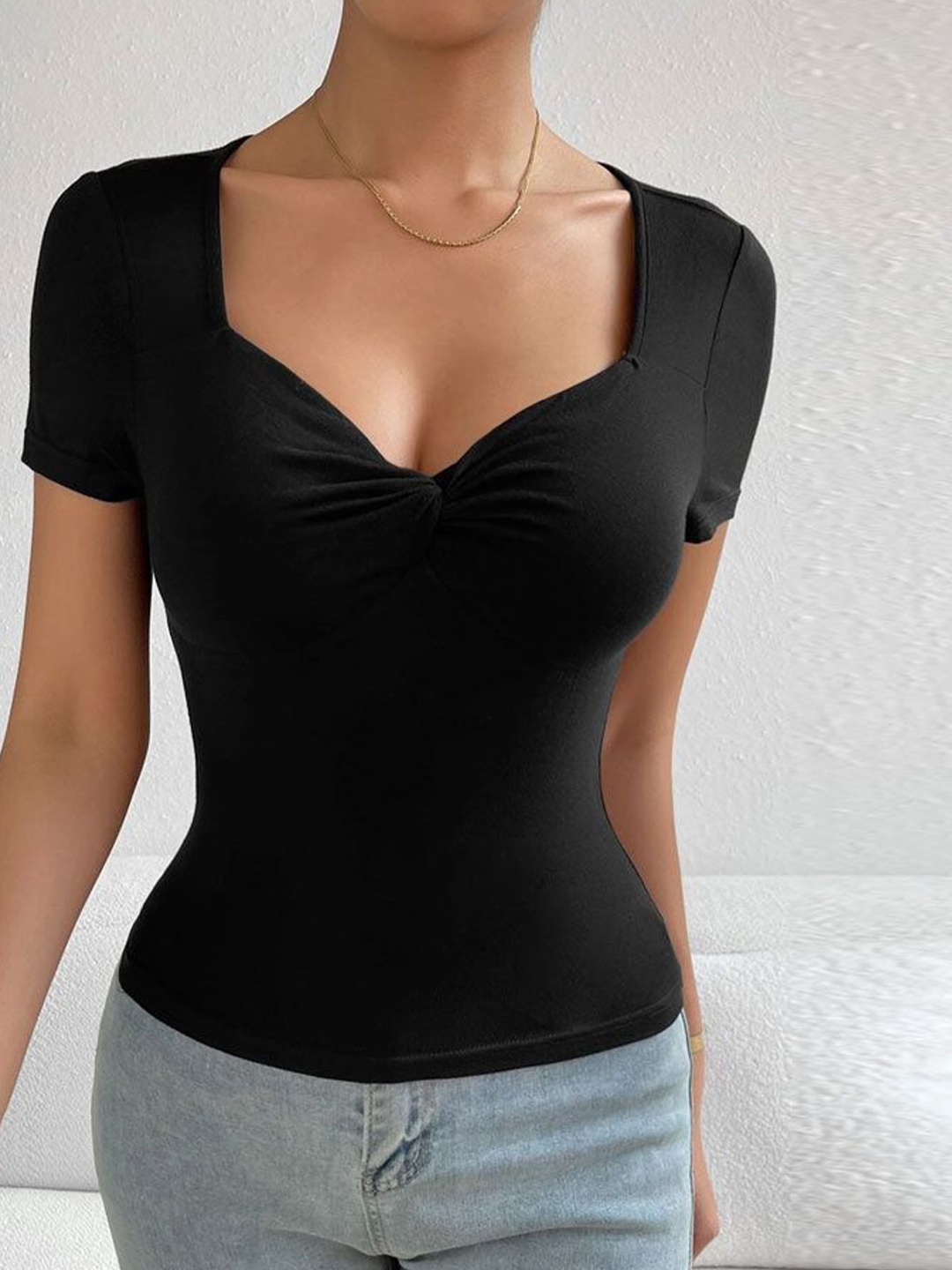 

StyleCast Women Solid Sweetheart Neck Top, Black