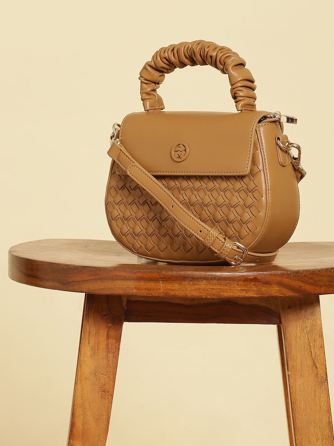

Label Ritu Kumar Textured Half Moon Handheld Bag with Cut Work, Mustard