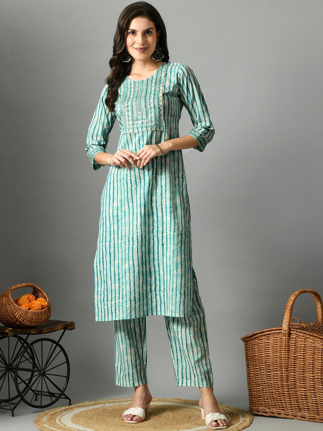 

Sangria Green Striped Embroidered Sequined Yoke Design Straight Cotton Kurta With Palazzos