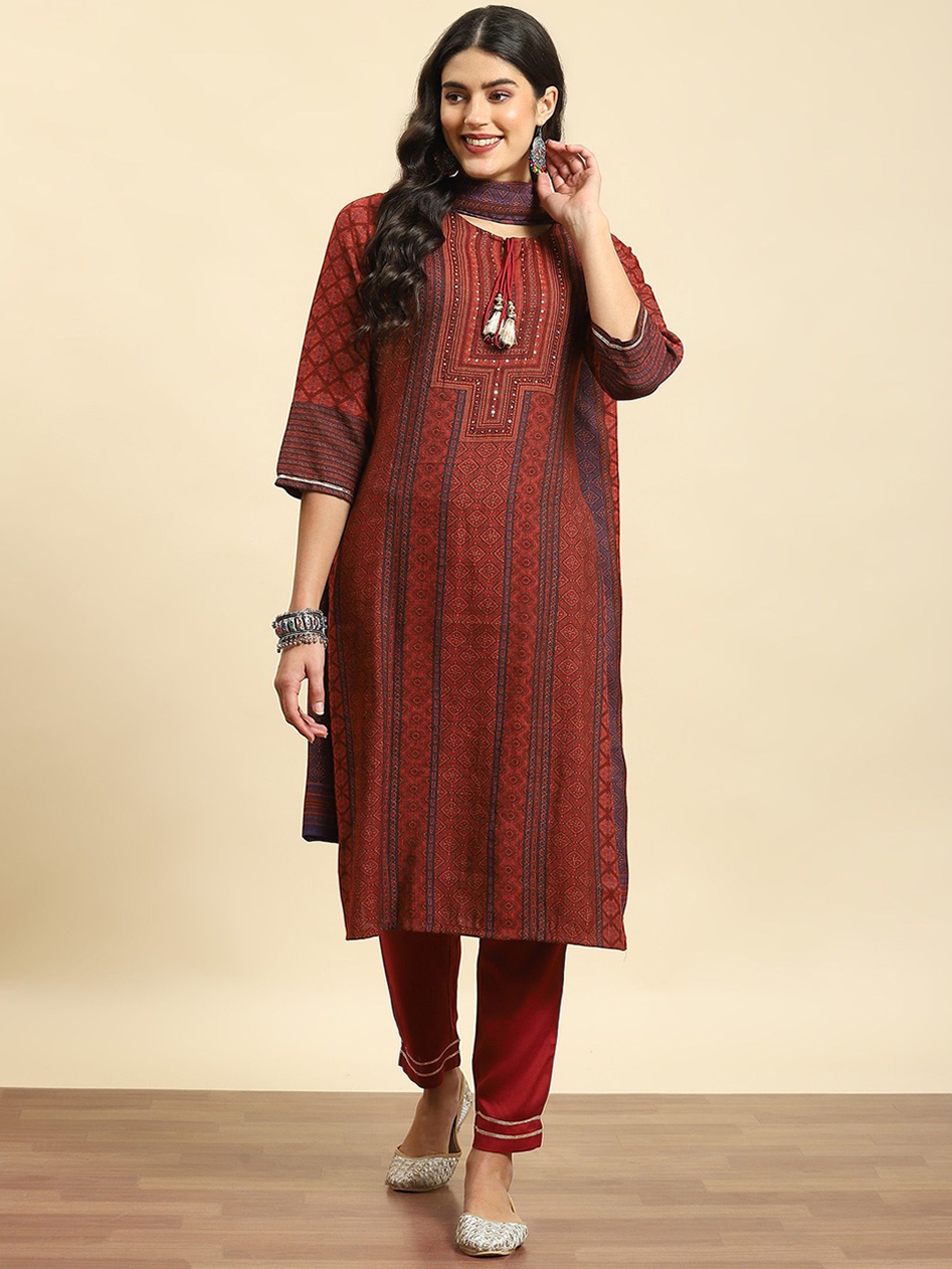 

Shree Ethnic Motifs Printed Sequinned Tie-Up Neck Straight Kurta with Trousers & Dupatta, Maroon