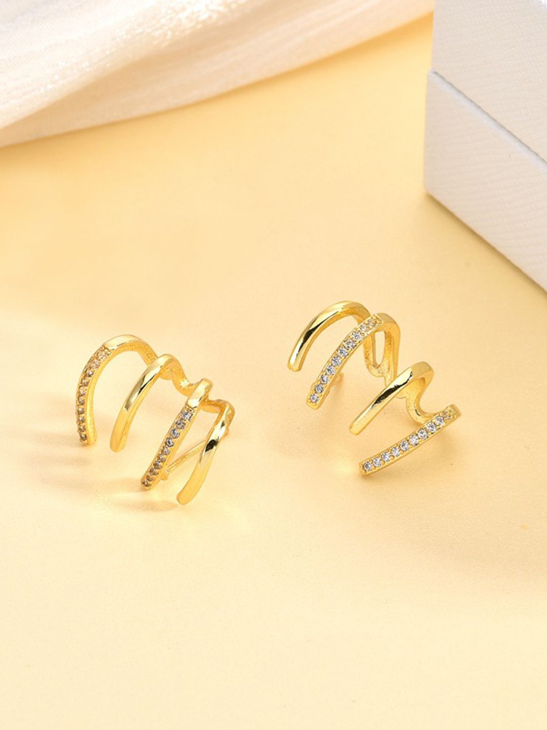 

VAGHBHATT Gold-Plated Cubic Zirconia Studded Classic Claw-Shaped Studs