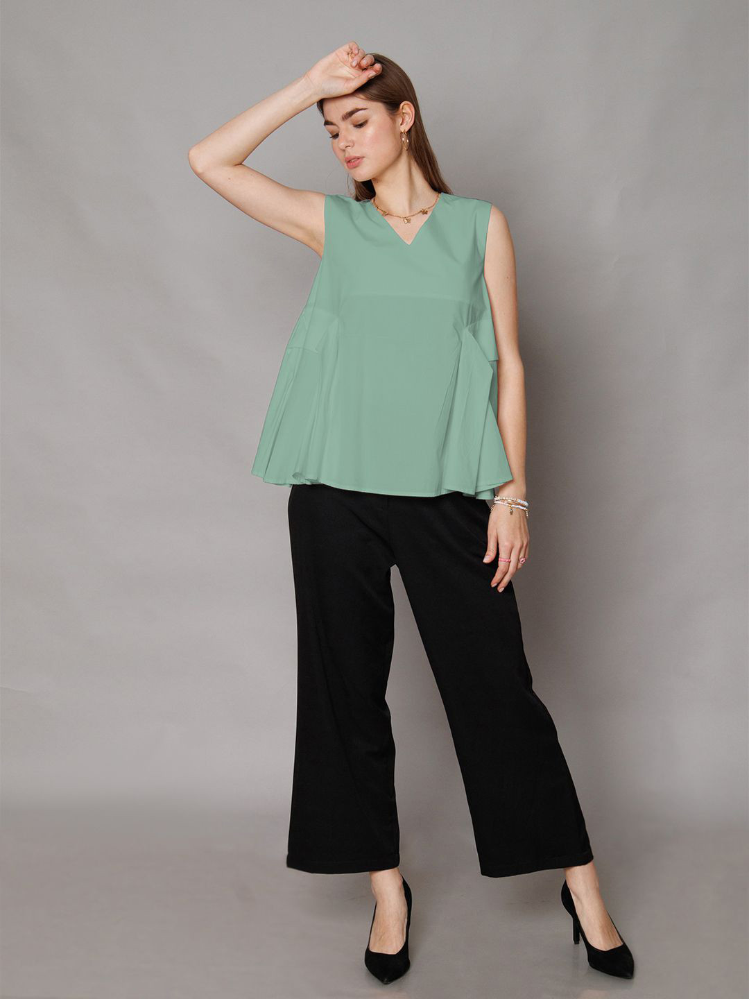 

Zink London Women Solid V-Neck Cotton Top, Green