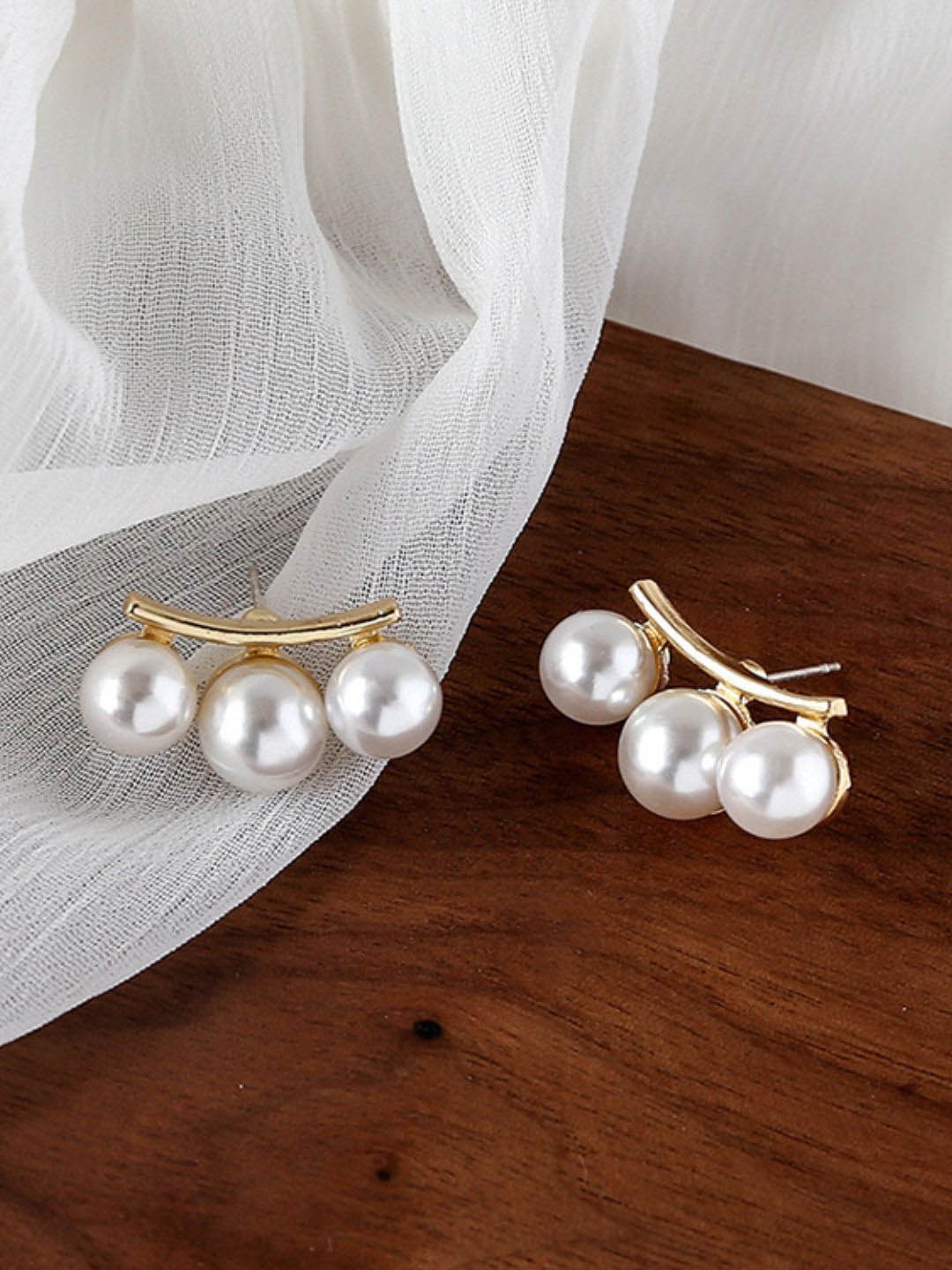 

DressBerry Stainless Steel Gold Plated Pearl Beaded Contemporary Studs