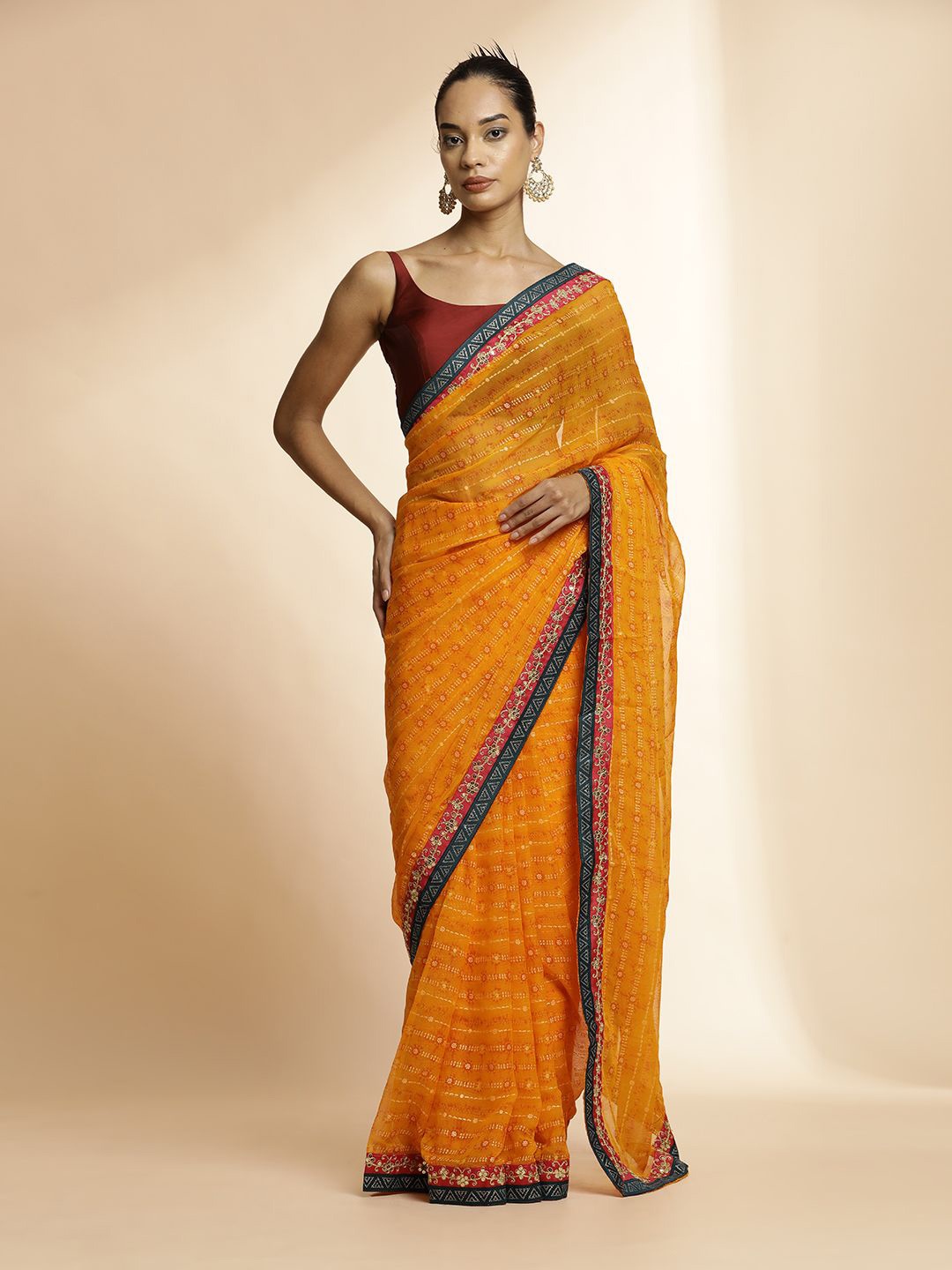 

Jaipur Kurti Ethnic Motifs Embroidered Pure Georgette Saree, Yellow