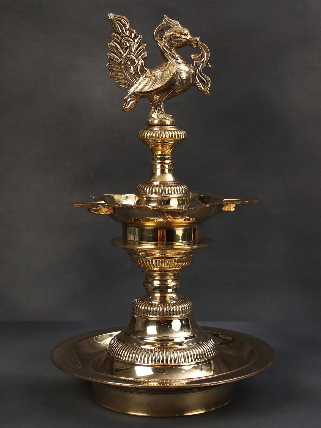 

Exotic India Brass Peacock Oil Lamp Stand, Gold