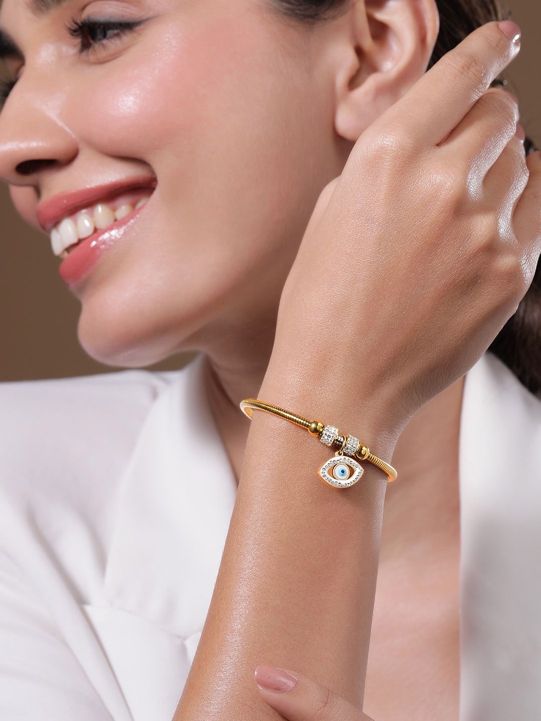 

Rubans 22K Gold Plated Stainless Steel Tarnish Free Demi-Fine Evil Eye CZ Charm Bracelet