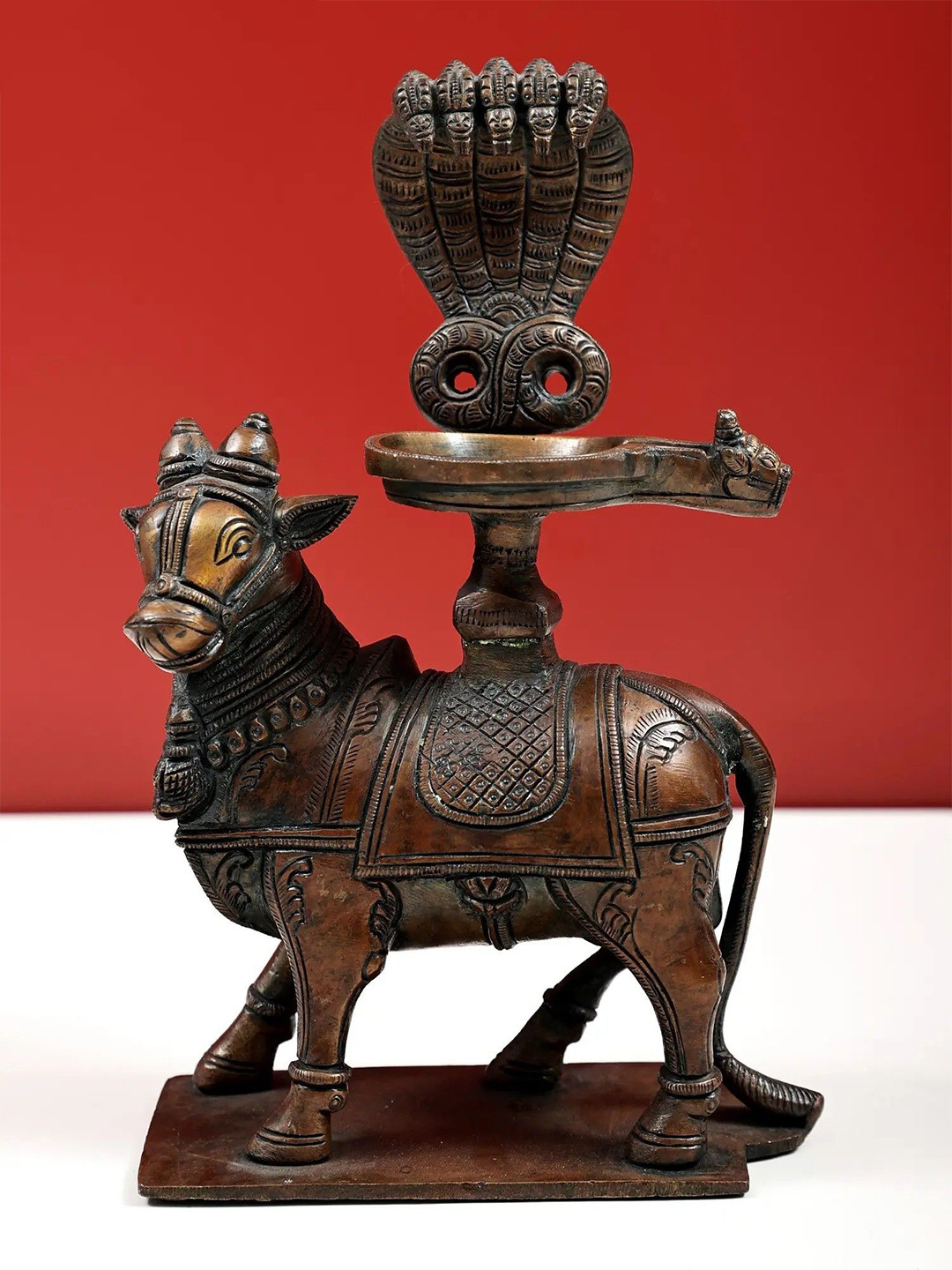 

Exotic India Brown Brass Abhisheka on Nandi Religious Idol Showpiece