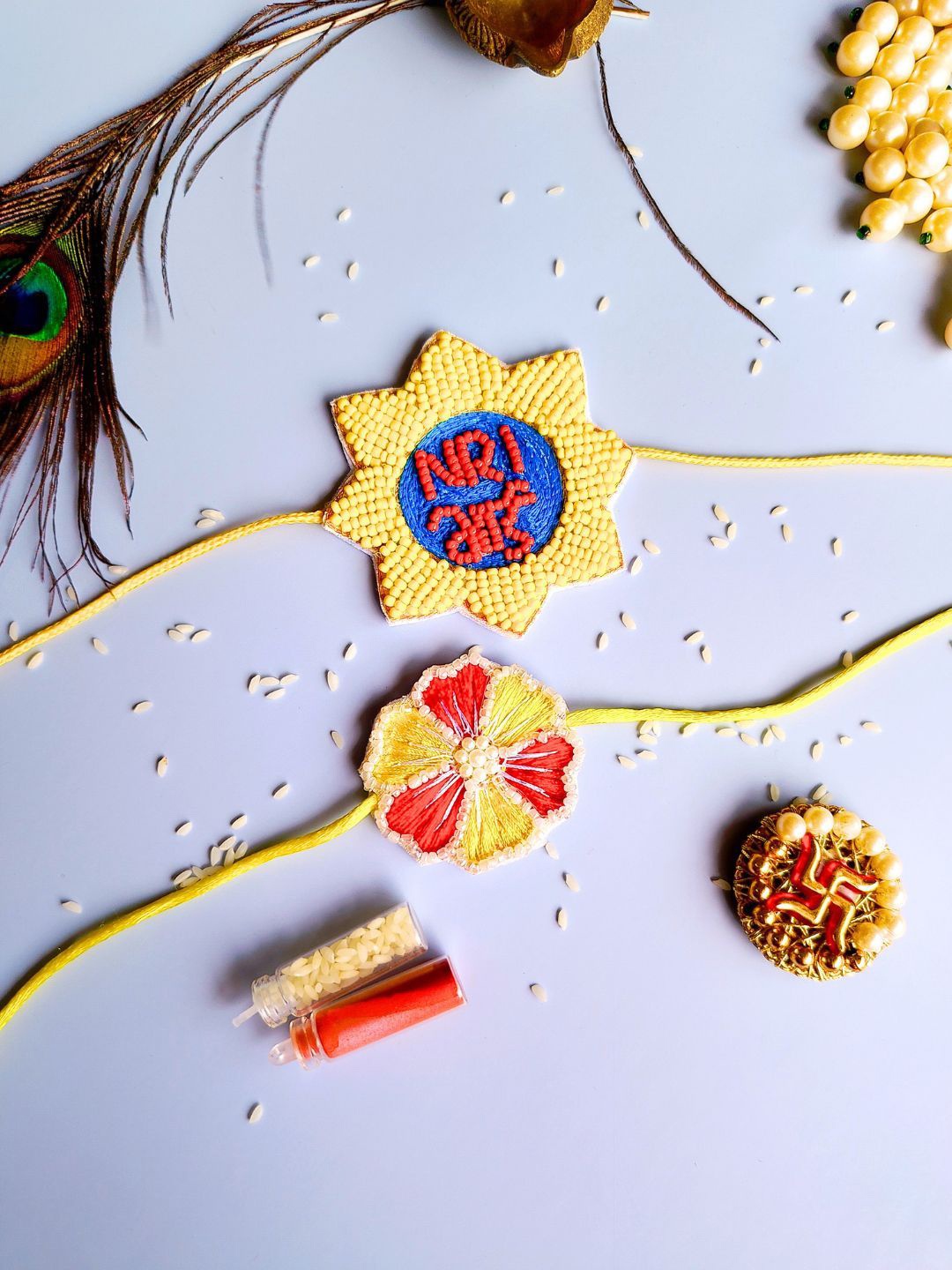 

Sangria Set Of 2 Rakhis With Roli Chawal & Card, Red