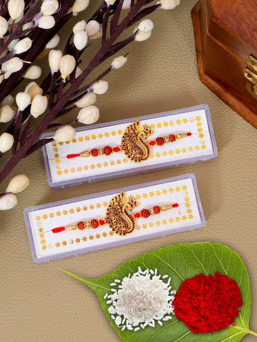 

Crunchy Fashion Set Of 2 Swan Design Beaded Thread Rakhi With Roli Chawal, Brown