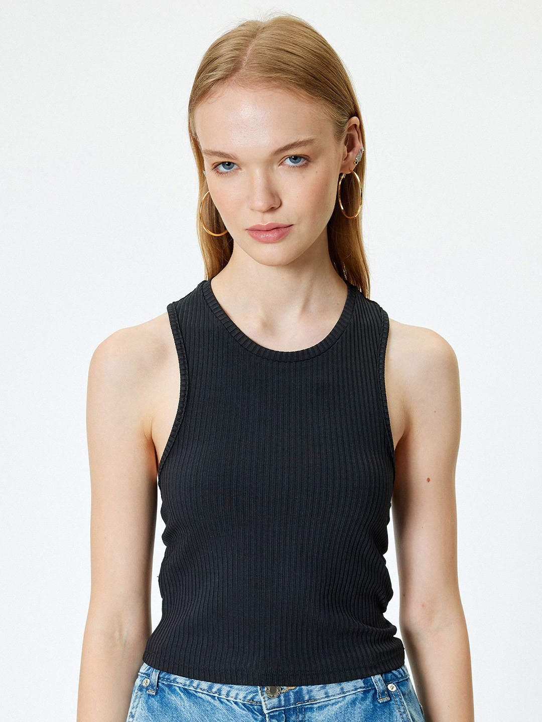 

Koton Women Solid Round Neck Polyester Top, Black
