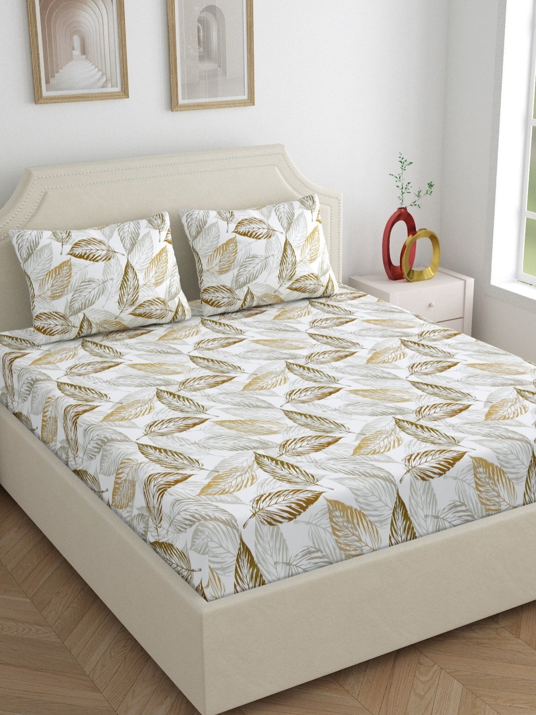 

Dreamscape Mustard & White Floral 180 TC King Bedsheet with 2 Pillow Covers