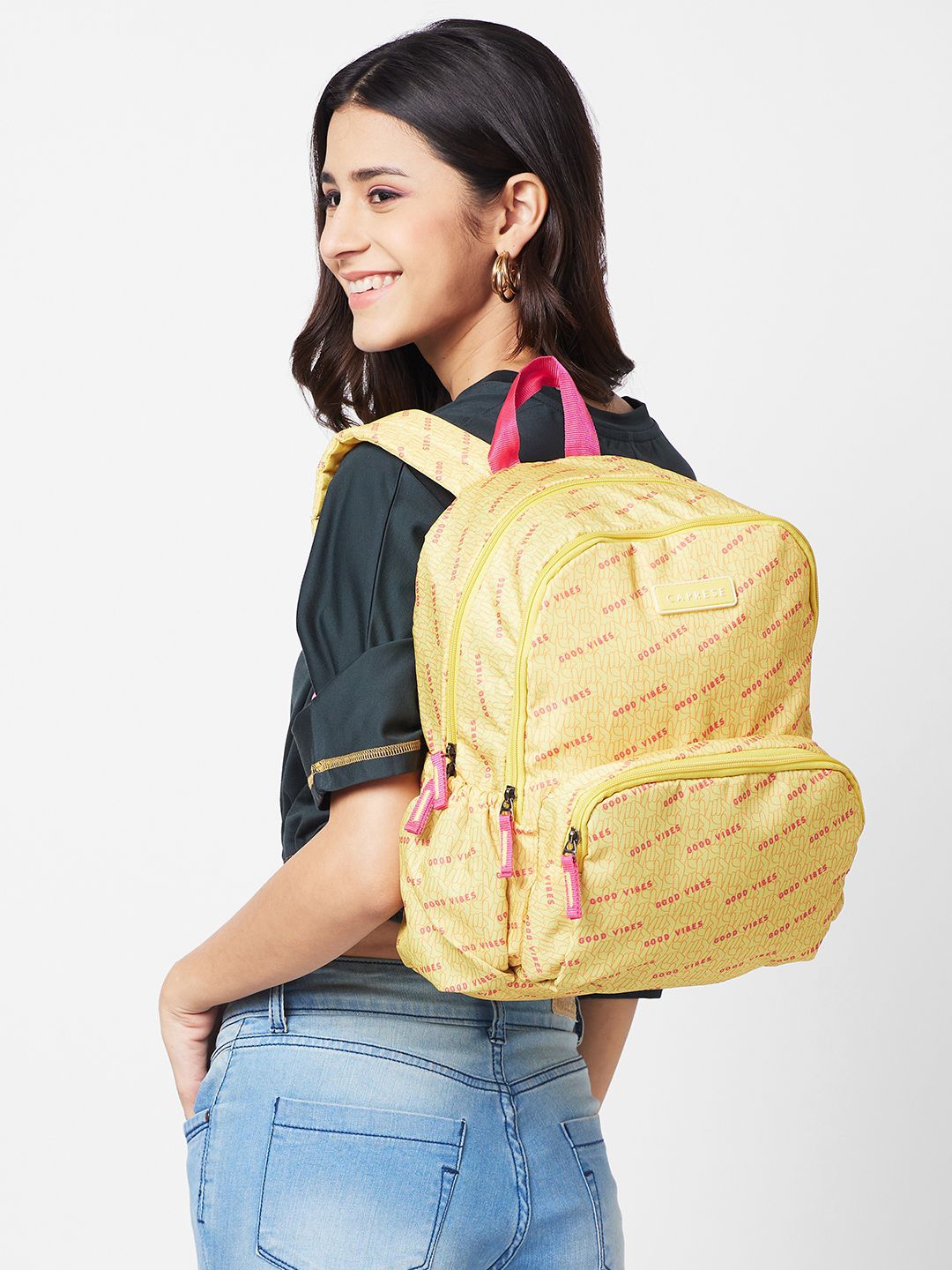 

Caprese Women Typography Backpack, Yellow