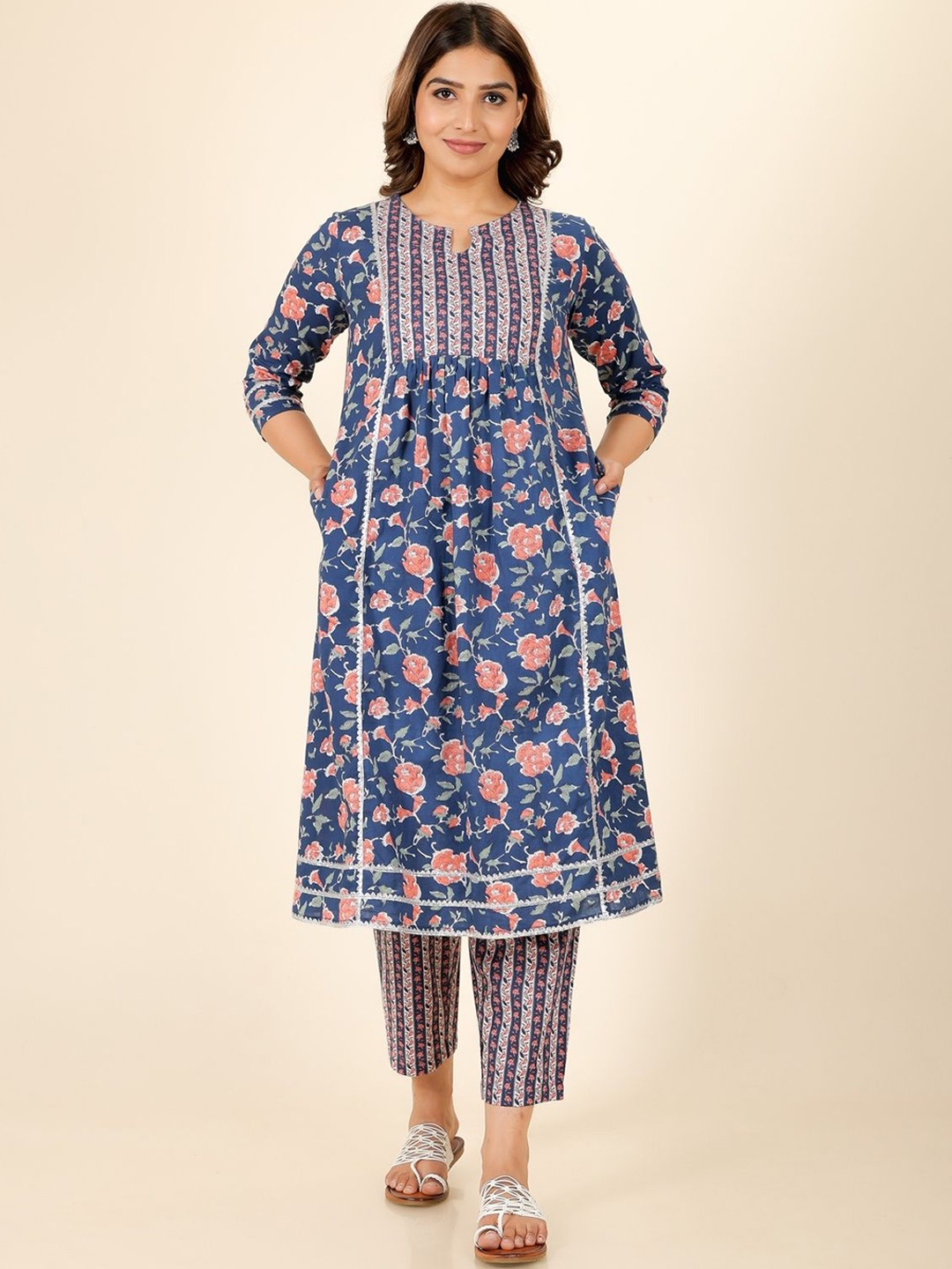 

Aramya Floral Printed Notch Neck Pleated Gotta Patti Cotton A-Line Kurta, Blue