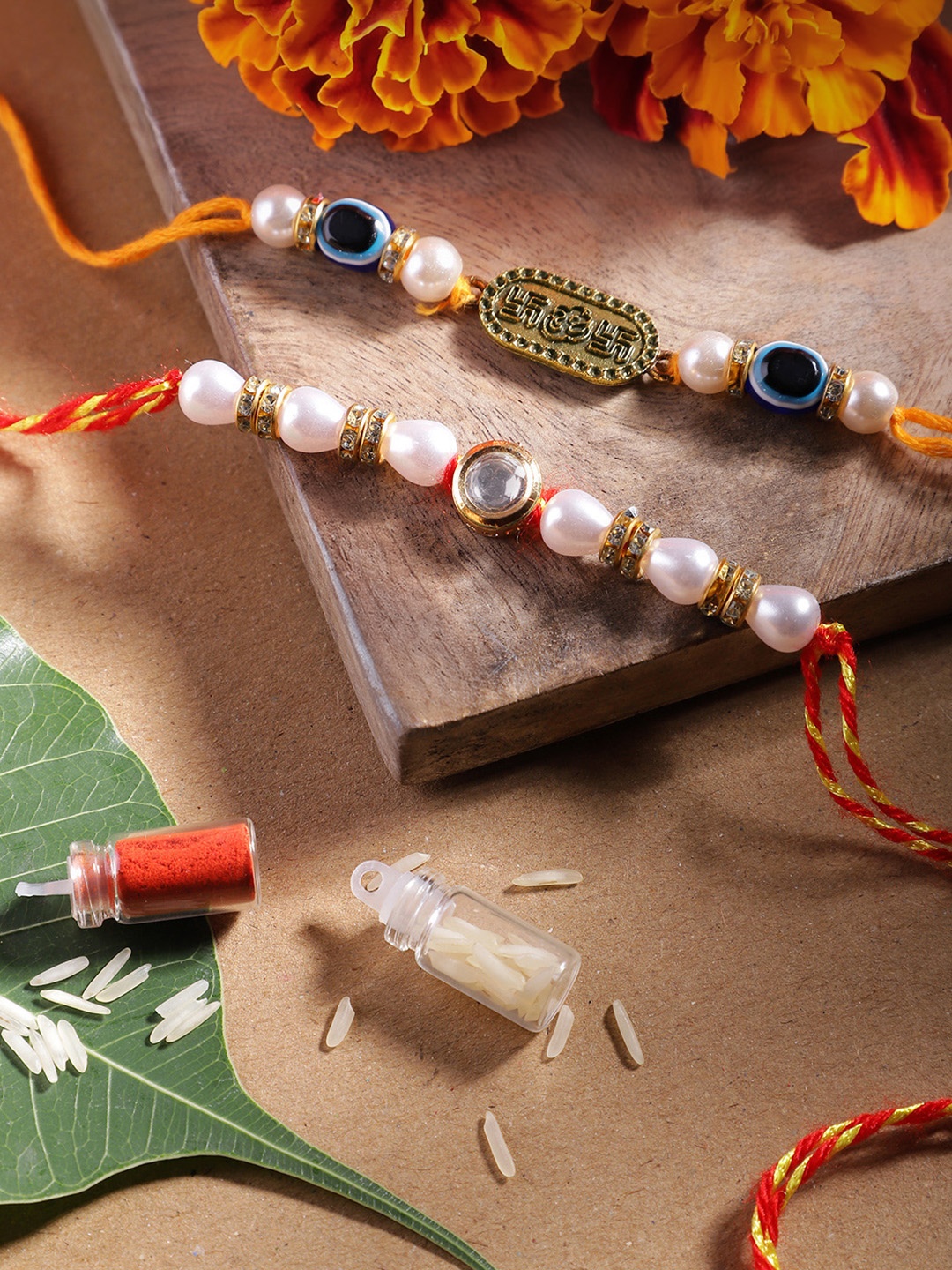 

Anouk Unisex Set of 2 Beaded Bhai Bhabhi Rakhis With Roli & Chawal, Multi